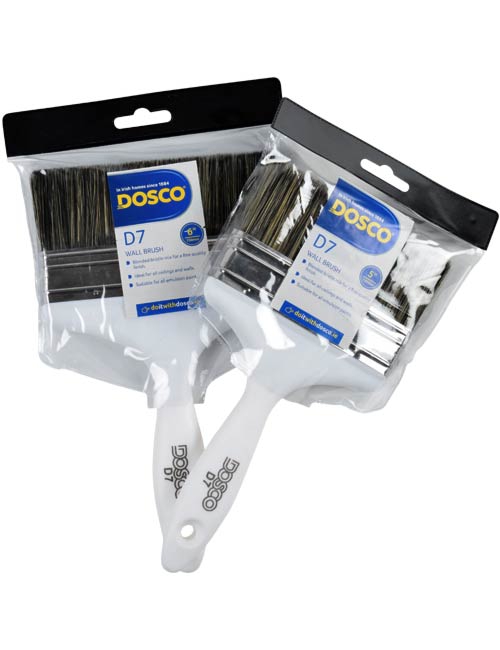 The Dosco D7 Wall Brush with white handle and black blended bristles in clear plastic packaging