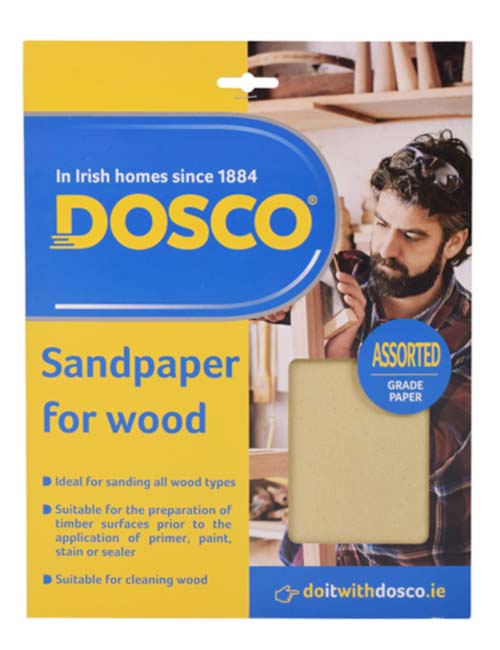 Sheets of beige cabinet glass sandpaper in Dosco packaging depicting a man sanding a wooden chair