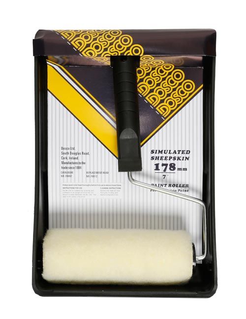 A black-handled paint roller and white simulated sheepskin roller on a black plastic paint tray in black & white Dosco packaging